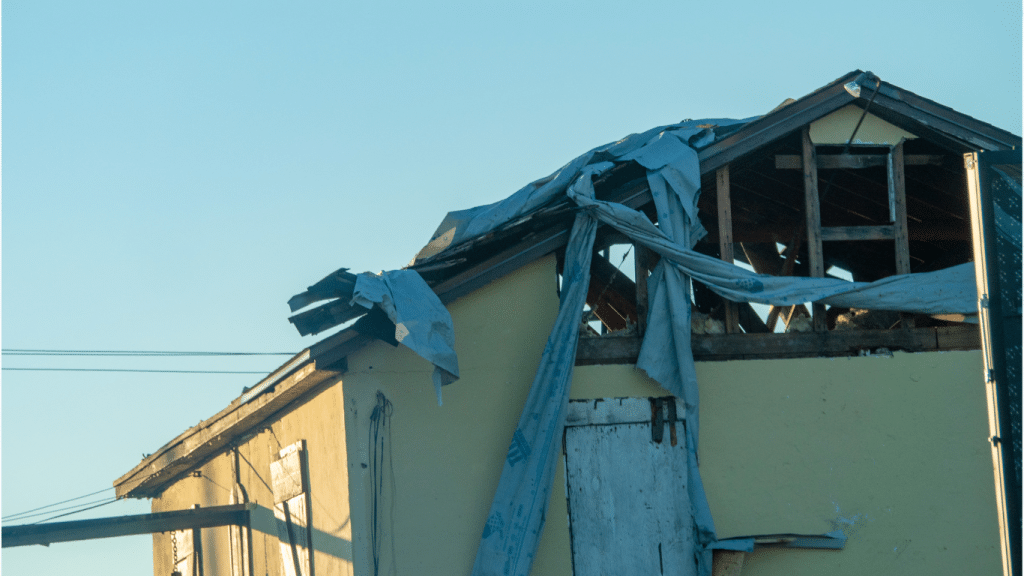 How do you properly tarp a roof